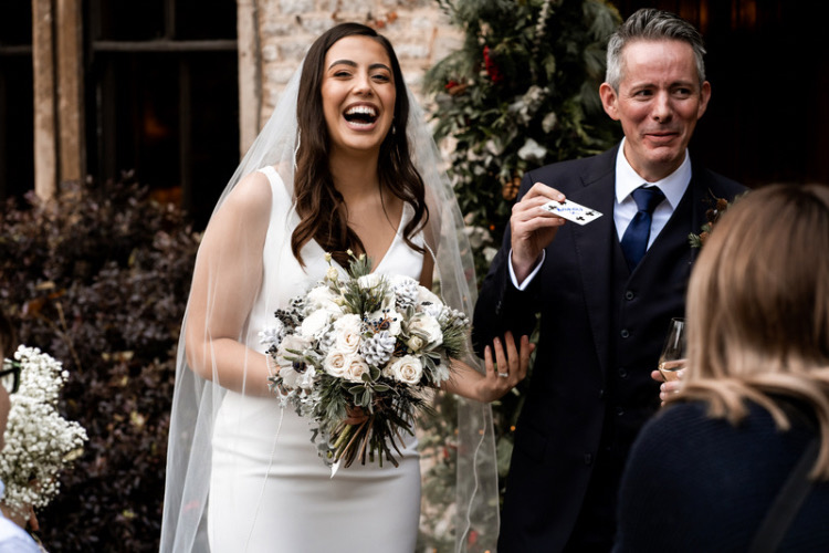 Richard entertaining a bride and groom at Manor House Hotel Castle Combe